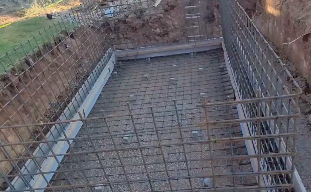 Rebar cage for a poured concrete hot tub