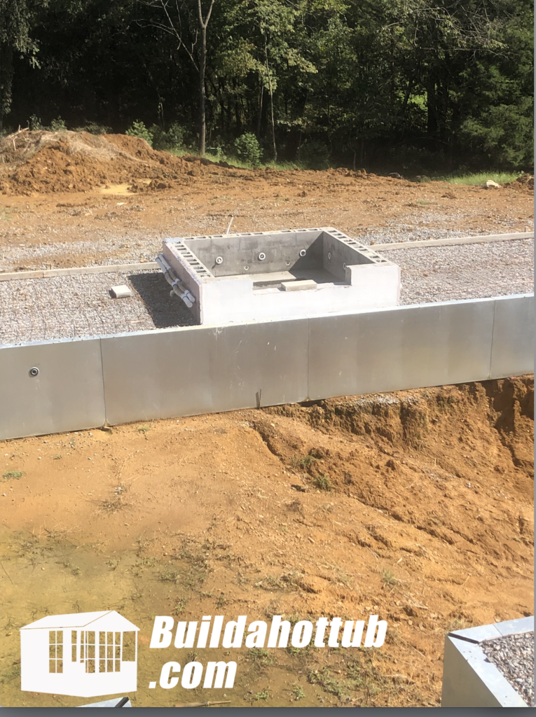 Waterproofing applied to the outside of the hot tub structure